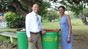 BHL's Corporate Communications Manager Sophia Cambridge chatting with Principal of the Parkinson Memorial Secondary School, Mr. Ian Holder about the donated garbage cans.
