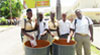 Students of the Christ Church Foundation School using the donated bins. 