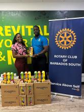 Pinehill Diary makes donation to Rotary Club of Ba